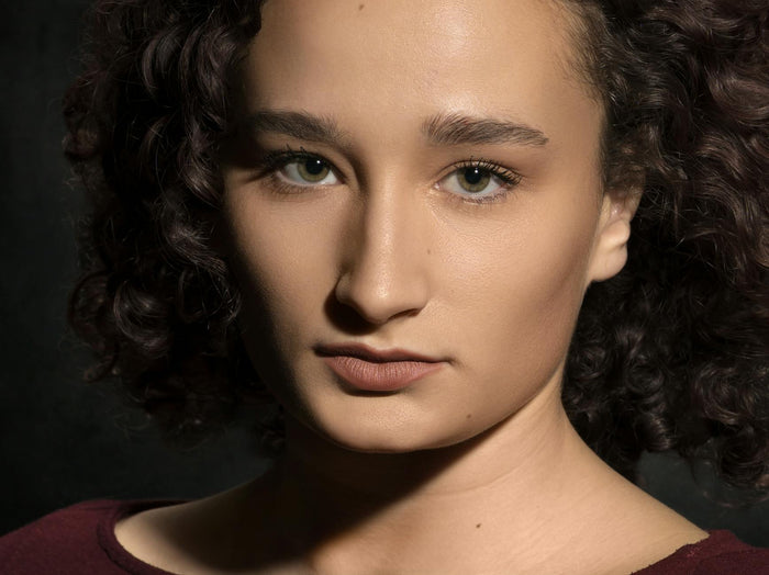 Woman embracing her natural curly hair