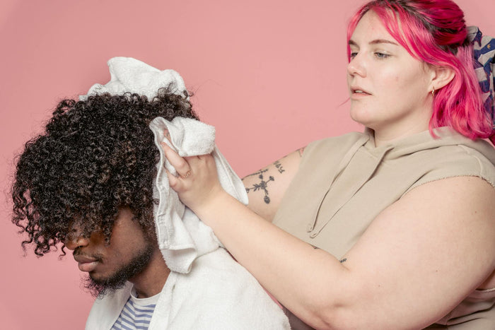 Plopping curly hair with a towel